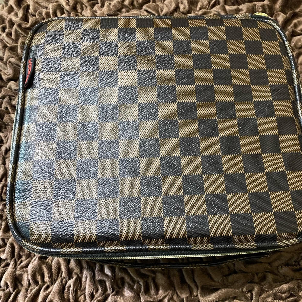 Cosmetic Bag - Never Used - has adjustable compartment spacers